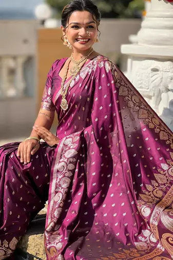 Wine elegant art silk woven saree with rich zari border