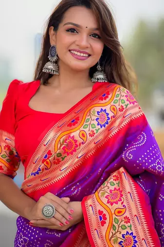 Purple elegant art silk woven saree with rich zari border