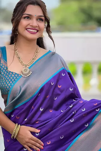 Purple elegant art silk woven saree with rich zari border