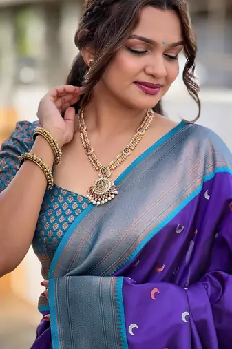 Purple elegant art silk woven saree with rich zari border