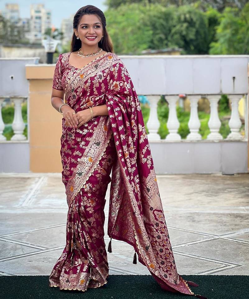 Wine elegant art silk woven saree with rich zari border
