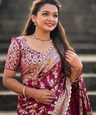 Wine elegant art silk woven saree with rich zari border 2