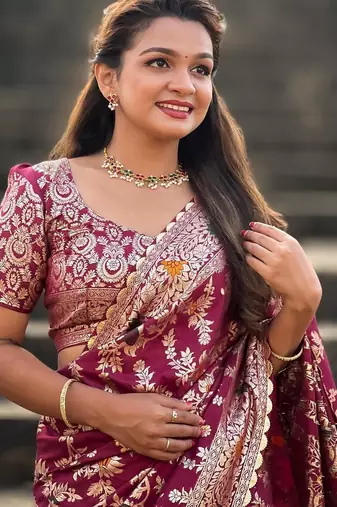 Wine elegant art silk woven saree with rich zari border