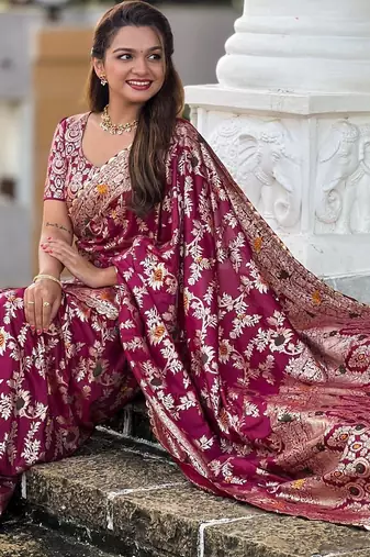 Wine elegant art silk woven saree with rich zari border