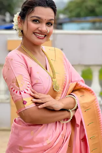 Pink elegant art silk woven saree with rich zari border
