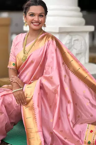 Pink elegant art silk woven saree with rich zari border