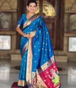 Turquoise elegant art silk woven saree with rich zari border