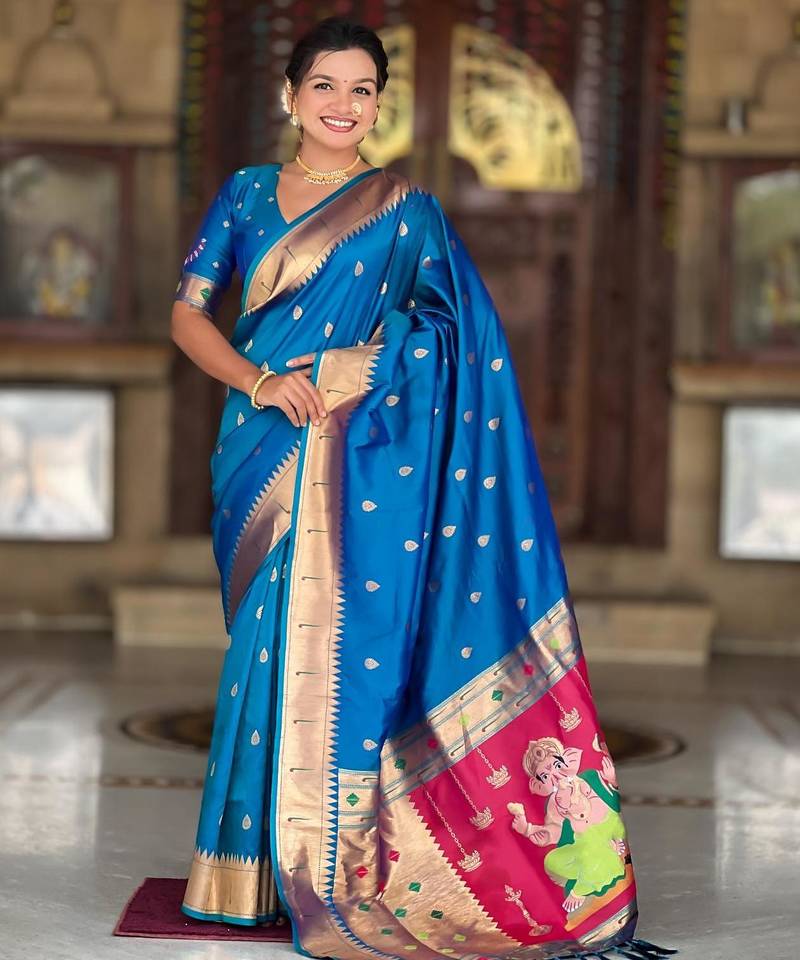 Turquoise elegant art silk woven saree with rich zari border