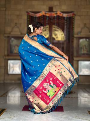 Turquoise elegant art silk woven saree with rich zari border 2