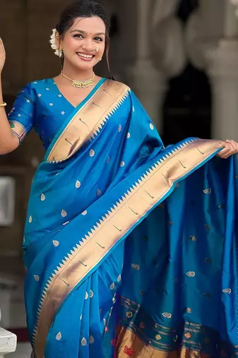 Turquoise elegant art silk woven saree with rich zari border