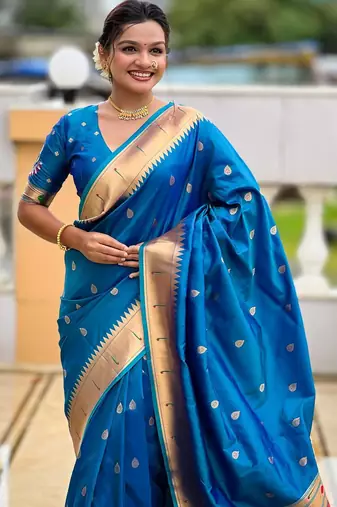 Turquoise elegant art silk woven saree with rich zari border