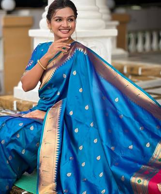 Turquoise elegant art silk woven saree with rich zari border 5