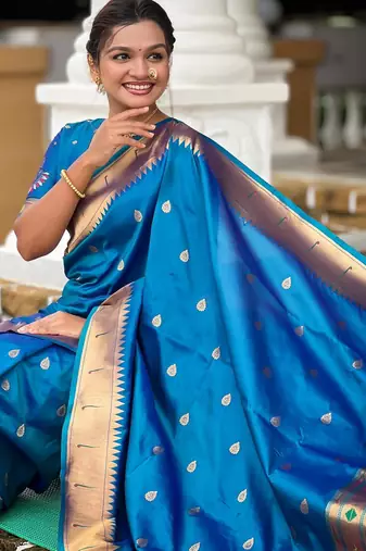 Turquoise elegant art silk woven saree with rich zari border