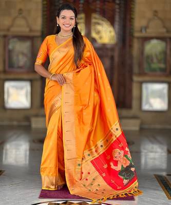 Orange elegant art silk woven saree with rich zari border 1