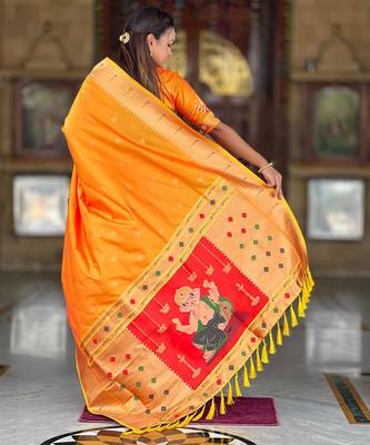 Orange elegant art silk woven saree with rich zari border 2