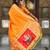 Orange elegant art silk woven saree with rich zari border