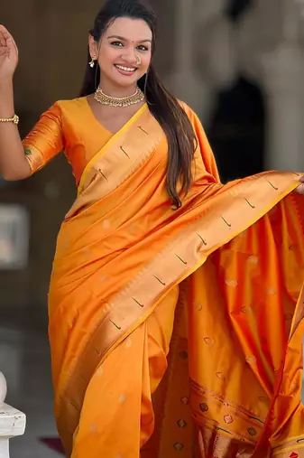 Orange elegant art silk woven saree with rich zari border