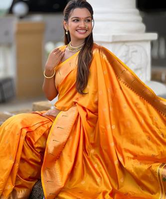 Orange elegant art silk woven saree with rich zari border 5