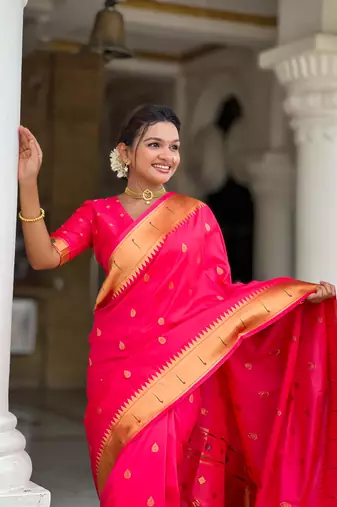 Pink elegant art silk woven saree with rich zari border