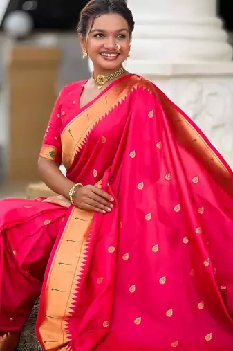 Pink elegant art silk woven saree with rich zari border