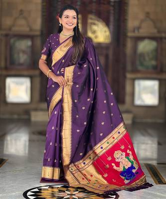 Wine elegant art silk woven saree with rich zari border 1
