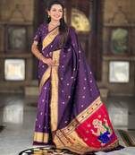 Wine elegant art silk woven saree with rich zari border