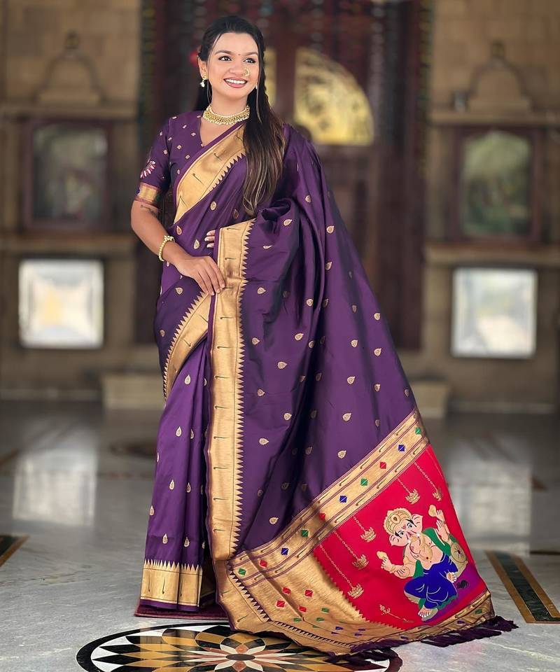 Wine elegant art silk woven saree with rich zari border