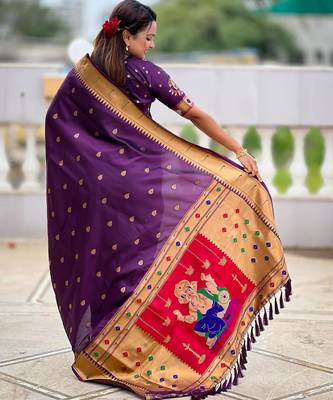 Wine elegant art silk woven saree with rich zari border 2