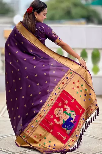 Wine elegant art silk woven saree with rich zari border