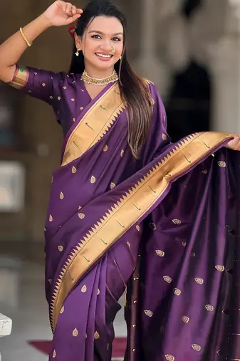 Wine elegant art silk woven saree with rich zari border