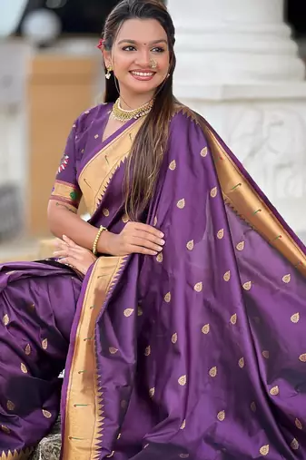 Wine elegant art silk woven saree with rich zari border