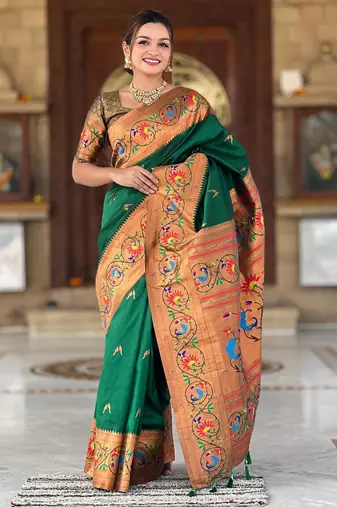 Green elegant art silk woven saree with rich zari border