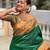 Green elegant art silk woven saree with rich zari border