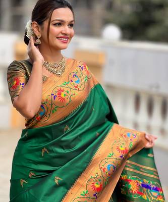 Green elegant art silk woven saree with rich zari border 3