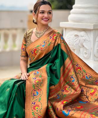 Green elegant art silk woven saree with rich zari border 4