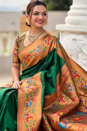 Green elegant art silk woven saree with rich zari border