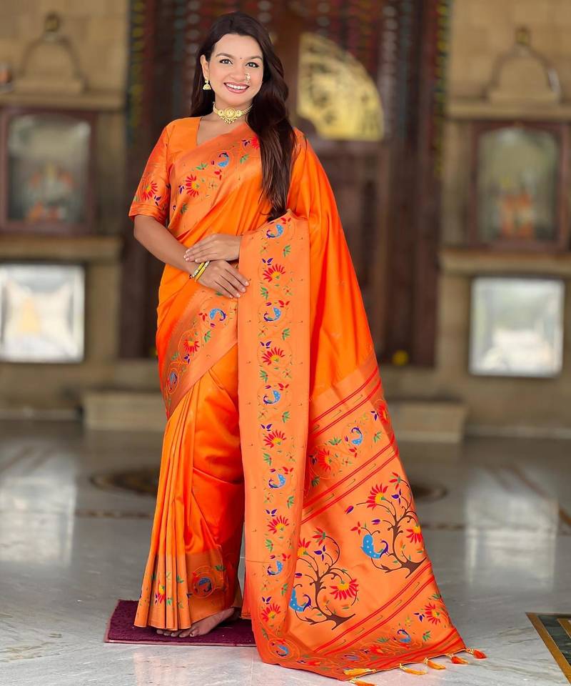 Orange elegant art silk woven saree with rich zari border