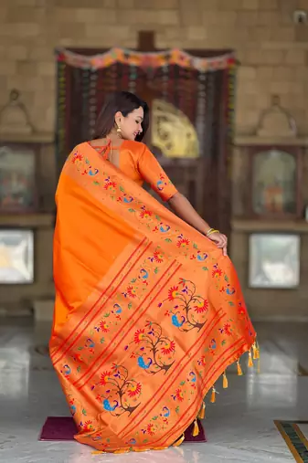 Orange elegant art silk woven saree with rich zari border