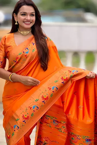 Orange elegant art silk woven saree with rich zari border