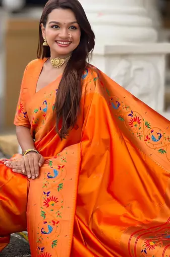 Orange elegant art silk woven saree with rich zari border