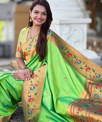 Green elegant art silk woven saree with rich zari border 5