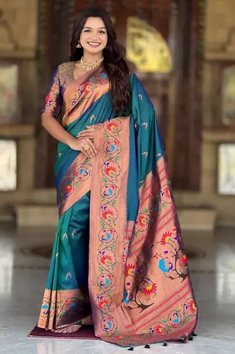 Teal elegant art silk woven saree with rich zari border