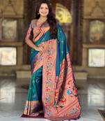 Teal elegant art silk woven saree with rich zari border