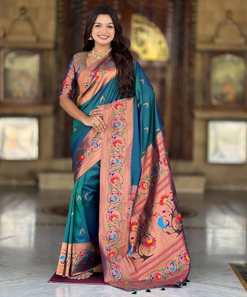 Teal elegant art silk woven saree with rich zari border