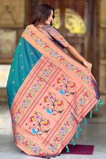 Teal elegant art silk woven saree with rich zari border