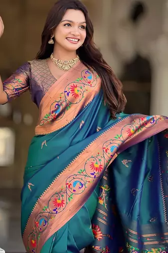 Teal elegant art silk woven saree with rich zari border