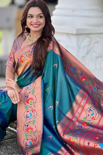 Teal elegant art silk woven saree with rich zari border