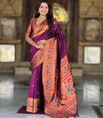 Wine elegant art silk woven saree with rich zari border