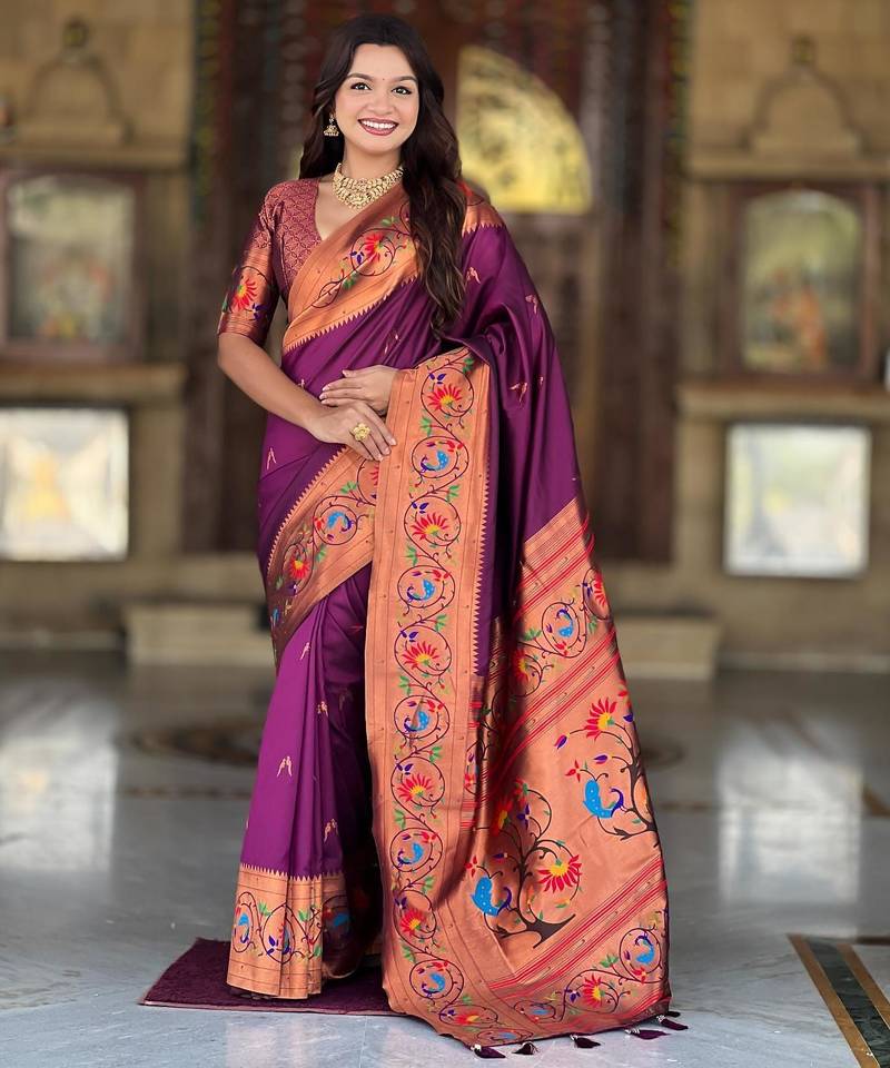 Wine elegant art silk woven saree with rich zari border
