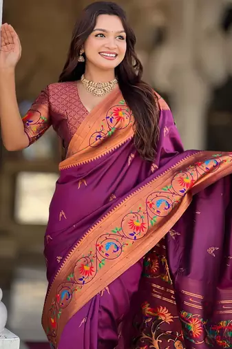Wine elegant art silk woven saree with rich zari border